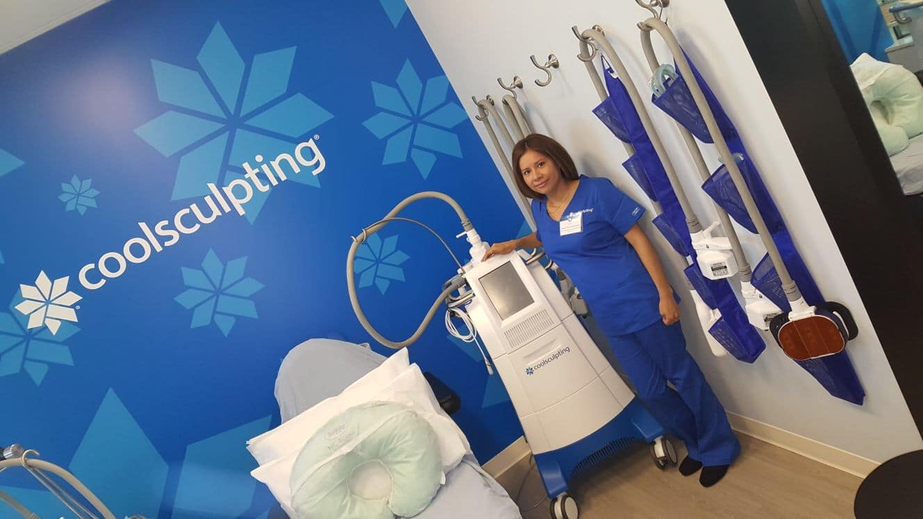 CoolSculpting technician with CoolSculpting machine.